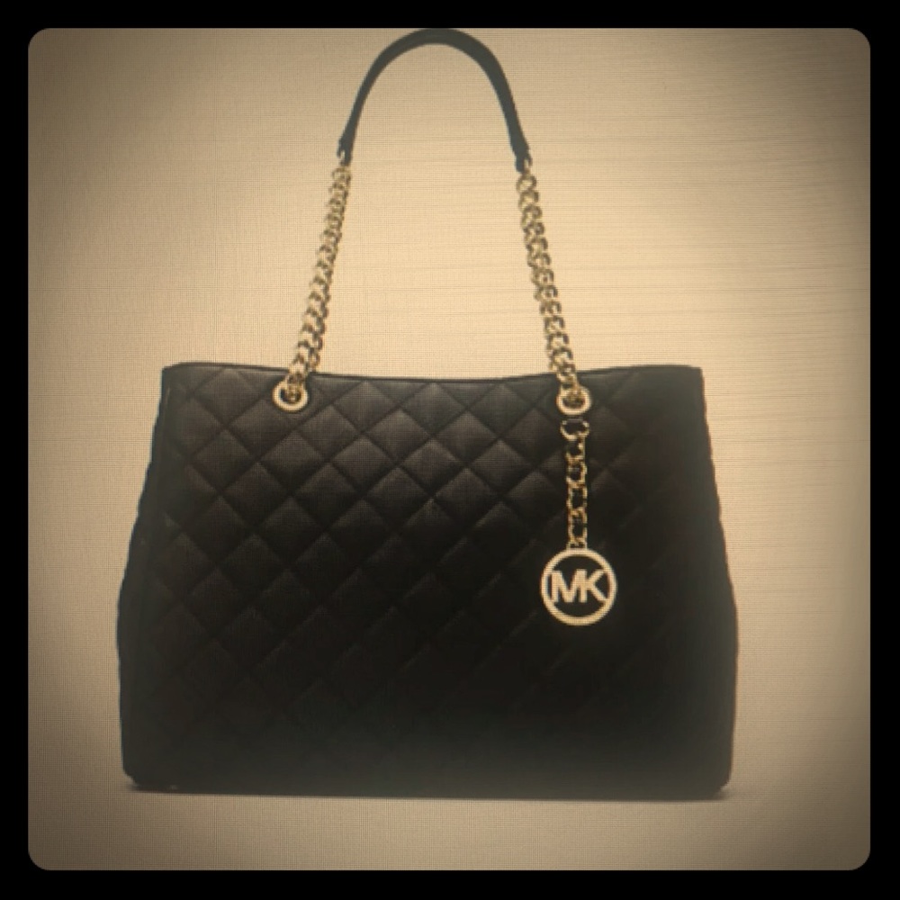 Used Michael Kors quilted black purse